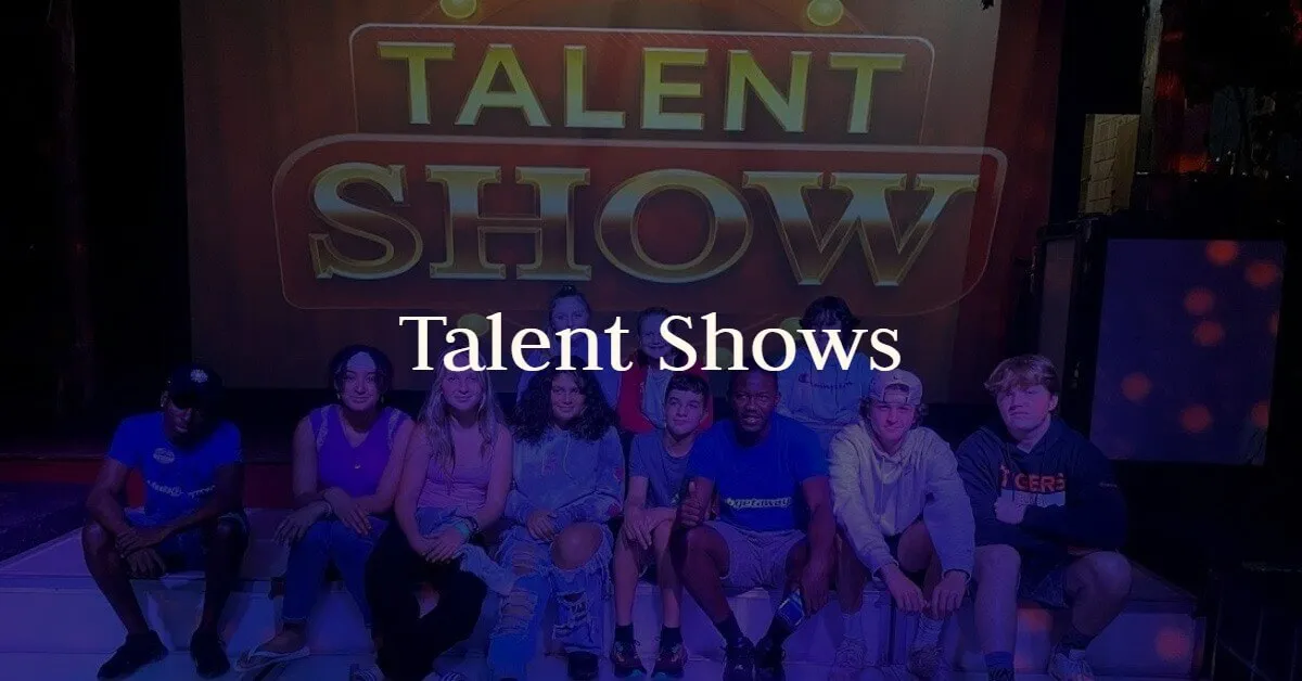 Guests gather on stage for the talent show