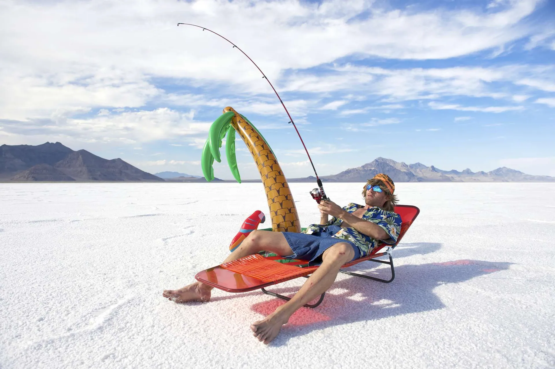 ice fishing on a frozen lake