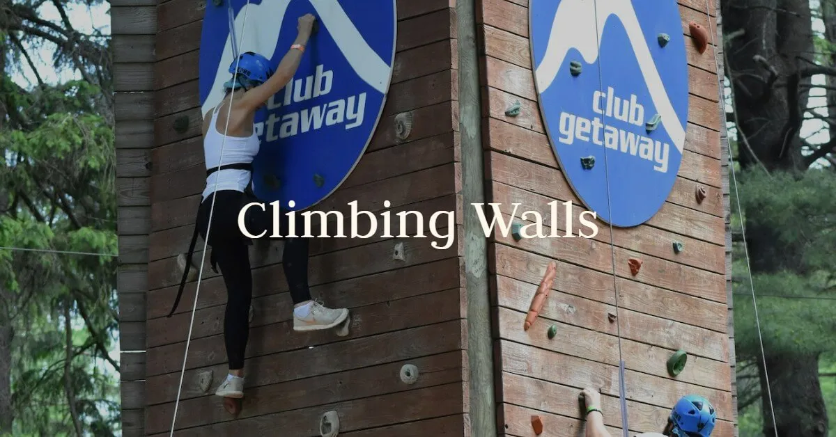 Climbers on the Club Getaway climbing wall tower