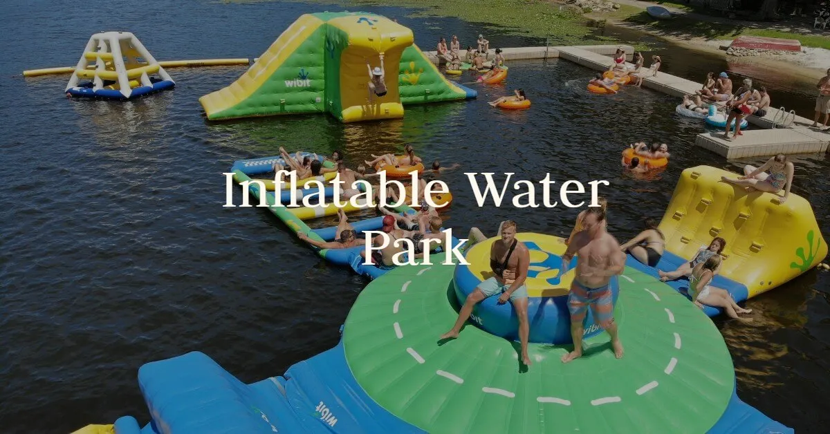 Guests climb and lounge on the colorful inflatable water park