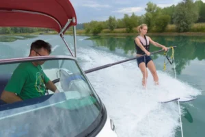 depositphotos 216302748 stock photo young woman water skiing sea